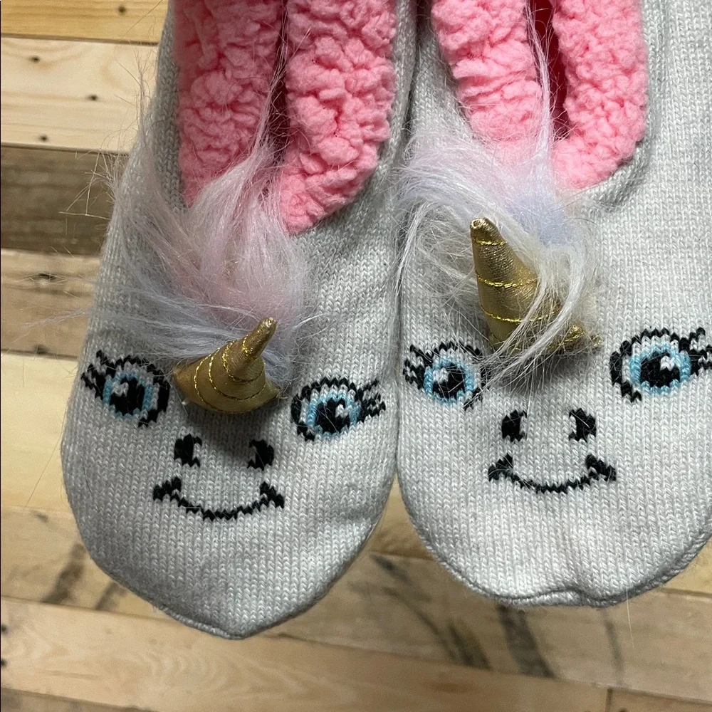 One Maurices brand boot socks and Unicorn Slippers